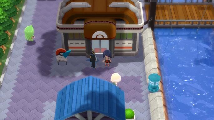 A Pokémon Trainer and their Empoleon stood outside of Canalave City Gym in Pokémon Brilliant Diamond and Shining Pearl.