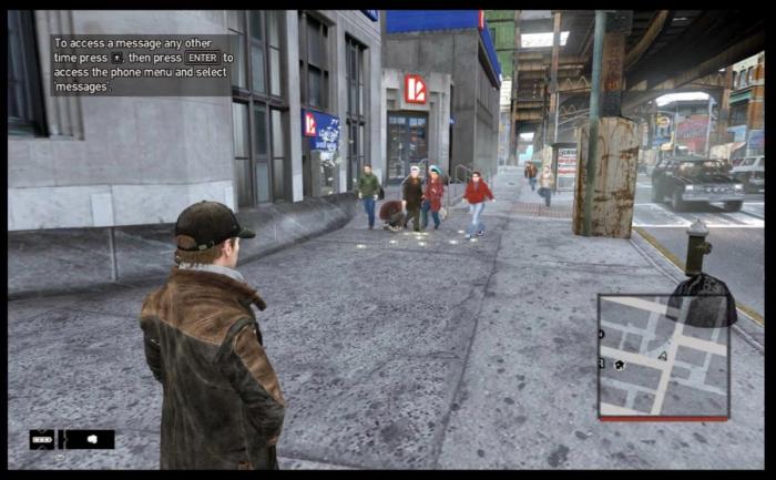 The player is dressed as Aiden Pearce thanks to the mod for GTA 4. The text box in the corner describes how to begin a phone hack.