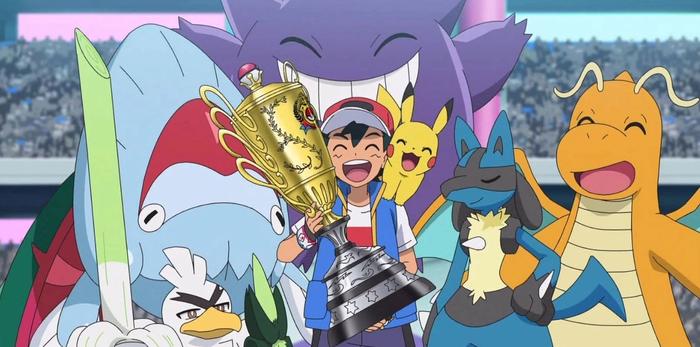 Ash surrounded by his winning team