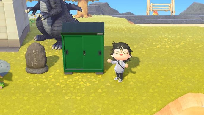 A player standing next to the Storage Shed in Animal Crossing: New Horizons.