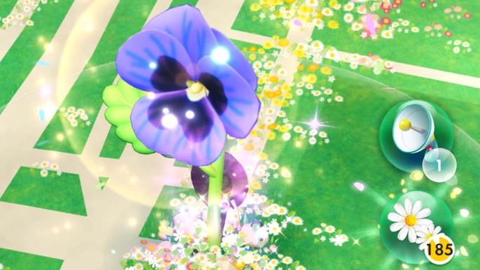 Screenshot from Pikmin Bloom, showing a large flower sprouting in the world