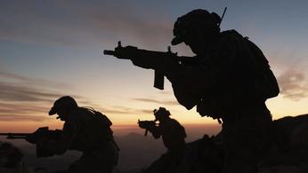 Image showing Modern Warfare players moving in front of dusk sky