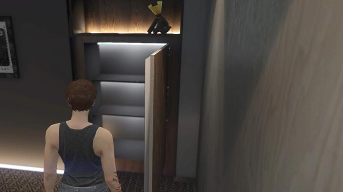GTA Online The Contract The player is standing in front of their open wall safe inside The Agency