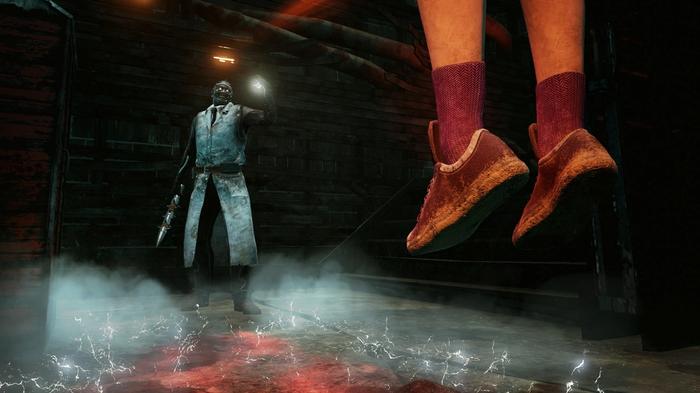 The Doctor laughing at a victim on the hook in Dead by Daylight