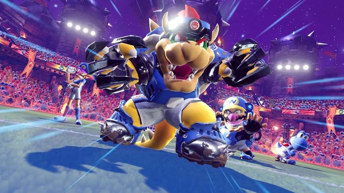 Bowser poses pre-match with Wario and Waluigi in Mario Strikers Battle League.