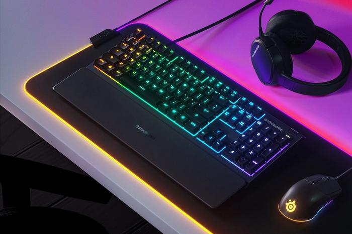 Best gift ideas for gamers - SteelSeries product image of a black keyboard with multicoloured backlit keys.