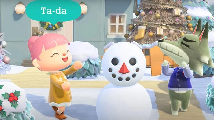 Animal Crossing New Horizons Villager and Player showing off a snowboy. The snowboy is in the center of the screen. The player is saying ta da while pointing at the snowboy.