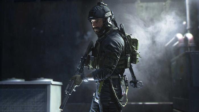 Captain Price holding a weapon in the dark in Modern Warfare 2.