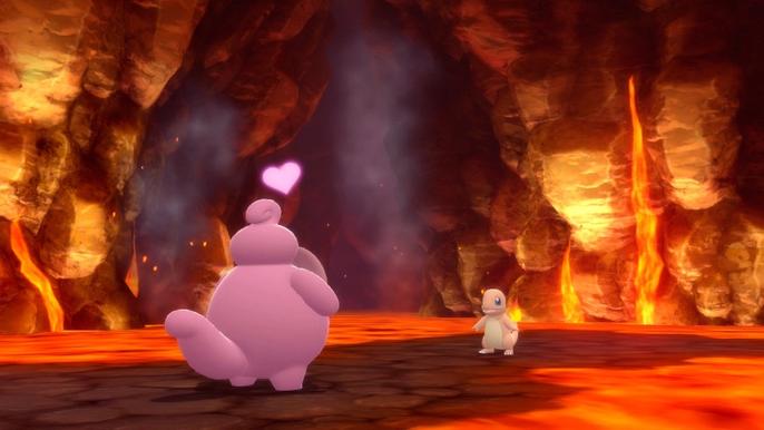 Lickitung faces Charmander in a battle in a Volcanic Cave of the Grand Underground in Pokémon Brilliant Diamond and Shining Pearl.