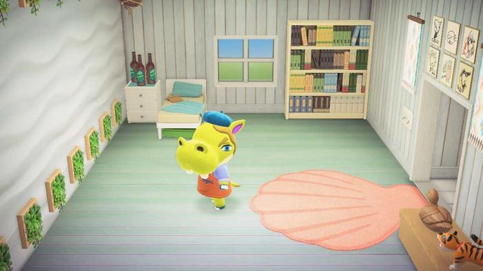 Animal Crossing New Horizons Happy Home Paradise Client Home Hippeaux. The room is mainly white with a light blue floor and there is a pink scallop shell shaped rug. Hippeaux is in the center of the image. 