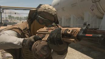 Warzone 2 player aiming down sights of gun