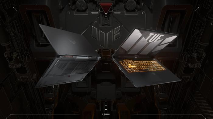 Best gift ideas for gamers - ASUS product image of a grey laptop with yellow backlit keys.