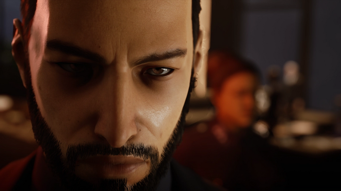 Close up image of Galeb Bazory, one of Swansong's playable characters. Tanned skin, thin black beard, piercing stare.