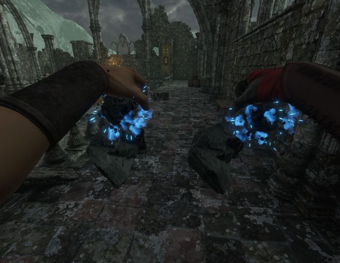 The hands are glowing blue and holding some rocks