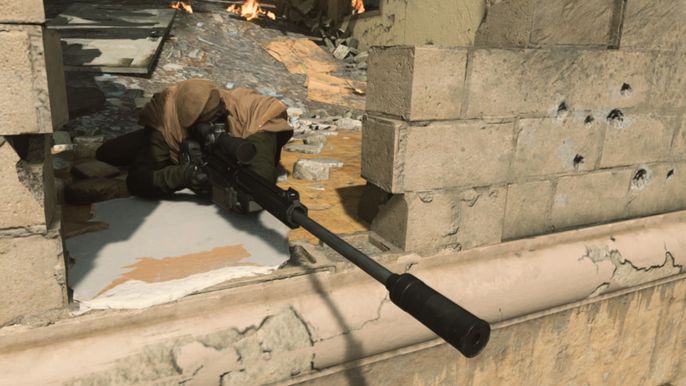 Image showing Warzone player laying prone holding a sniper rifle