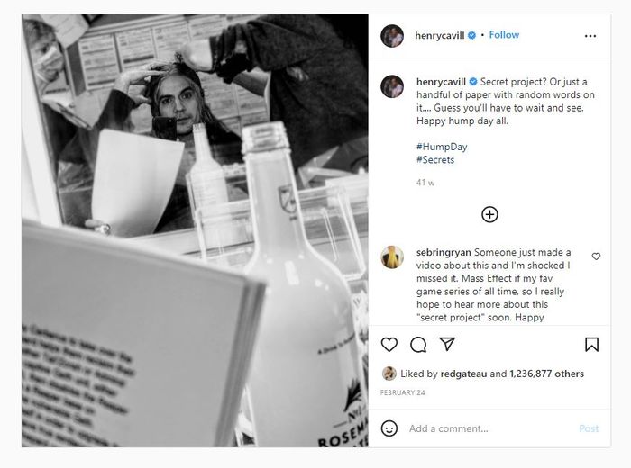 Screenshot of Henry Cavill's Instagram post, where he's holding a blurred out script in front of a mirror. His caption states "Secret project? Or just a handful of paper with random words on it.... Guess you'll have to wait and see. Happy hump day all."