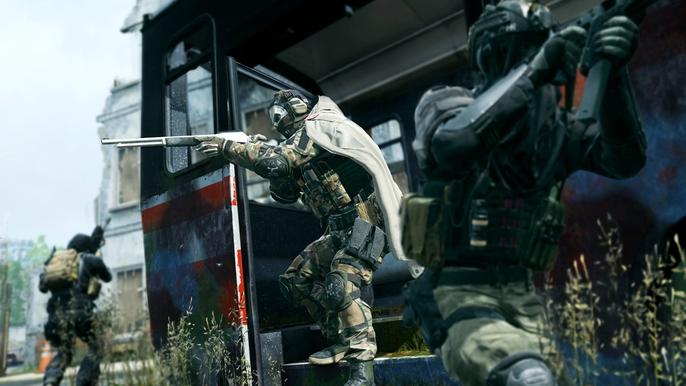 Modern Warfare 2 player aiming with gun near bus