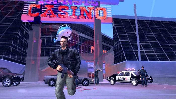 The main character in GTA III runs away from cops, carrying an assault rifle.