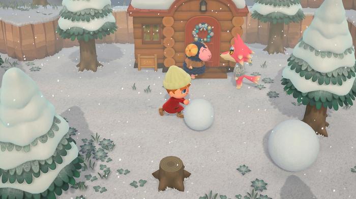 A character - the Resident Representative - is rolling snowballs in Animal Crossing: New Horizons during the season of winter.