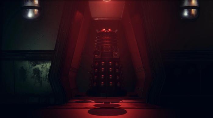 Dark room, Dalek under a red light down a corridor.