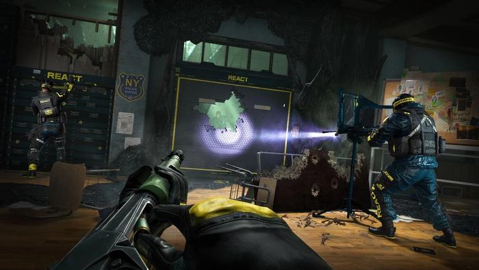 Rainbow Six Extraction screenshot - soldier on the left is trying to seal up a broken wall. Soldier on the right has a turret placed towards a separate piece of the broken wall, with an Archaen on the other side. Soldier in the middle is aiming a gun at the same Archaen.