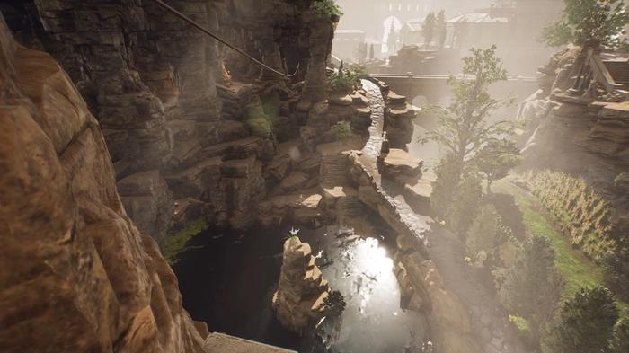 The Forgotten City. A view into the pond and farm below the portal. There is a tall rock formation in the center of the body of water on the left. There is a flower on top of this. There is a zipline on the left leading across from the high rock to the other side. 