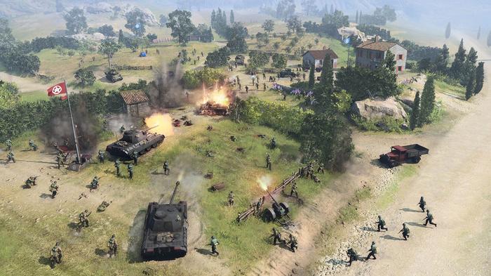 A battlefield with tanks and soldiers in Company of Heroes 3.