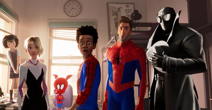 All six Spider-people from different dimensions are standing together.