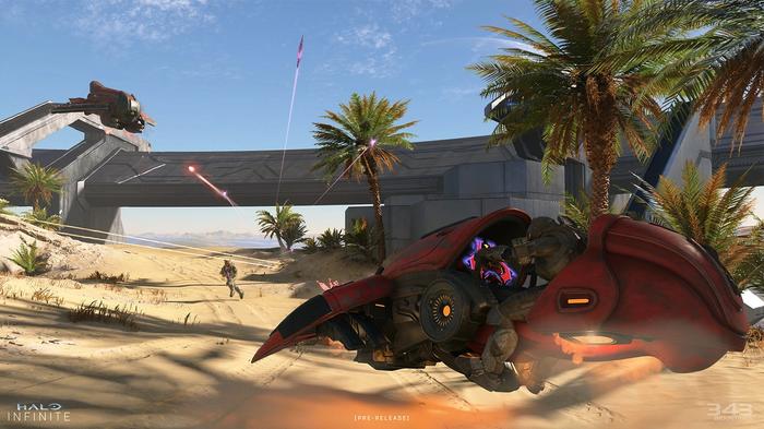 Halo Infinite fighters and vehicles battle on a desert.