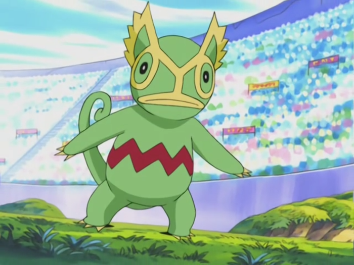 Green chameleon Pokémon Kecleon in a battle arena.
