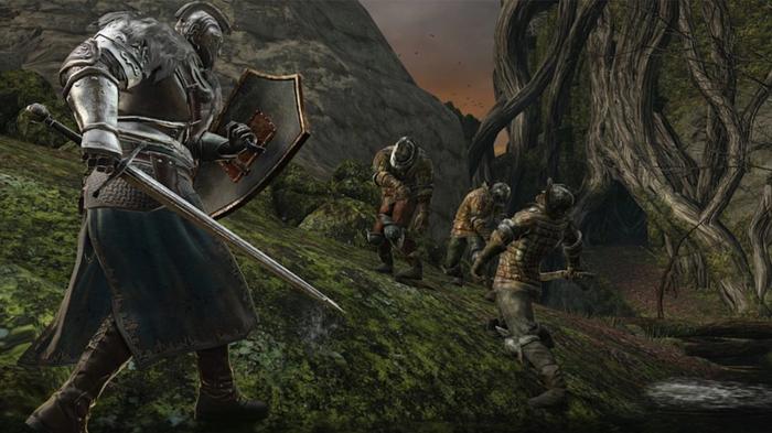The character is about to fight three enemies in Dark Souls.