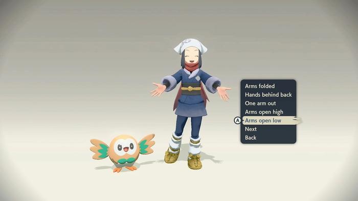 A Pokémon Trainer with their Rowlet.