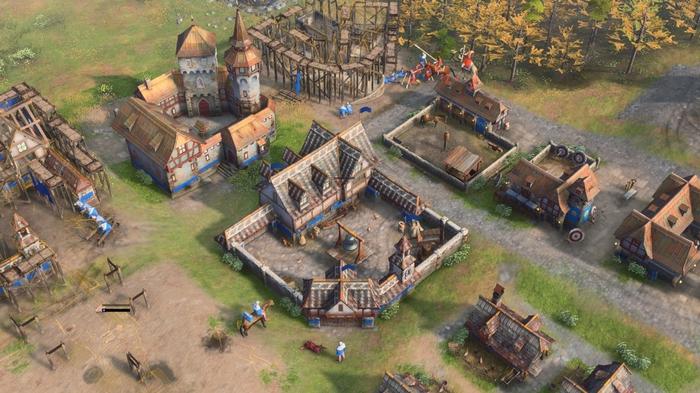 A small village inhabited by the Holy Roman Empire civilisation being attacked by the Abbasid Dynasty in Age of Empires 4.