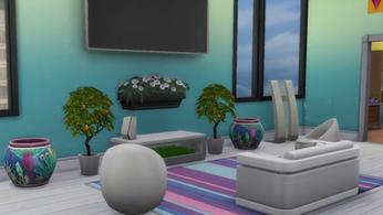 Sims 4. An Apartment Living Room That Is Fully Furnished. The image shows a blue living room that has white sofas and a tv hung on the wall. There are several indoor plants below the tv and a stripy rug under them.