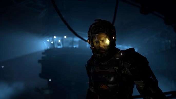 Jacob Lee walking through a dark ship in The Callisto Protocol.