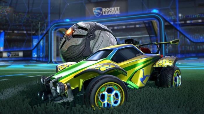 A green car is next to a ball in Rocket League.