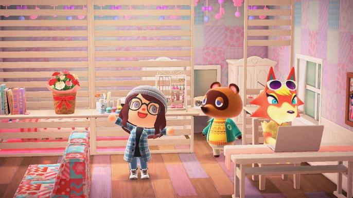 Animal Crossing New Horizons Happy Home Paradise. The Player, Tom Nook and Audie are standing in Audie's remodeled home. Audie is sat at the laptop on the right. The player is on the left. Tom Nook is in the middle