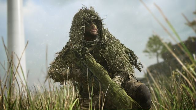 Image showing Warzone 2 player wearing ghillie suit and holding sniper