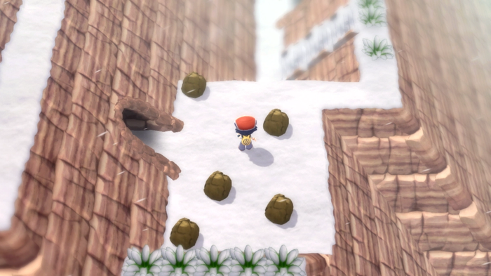 A Pokémon Trainer scaling Mount Coronet, in a particular area with rocks that can be broken using Hidden Moves Rock Smash in Pokémon Diamond and Pearl.