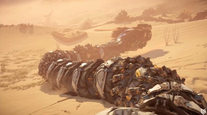 A snake-like machine called the Slitherfang moves through the desert