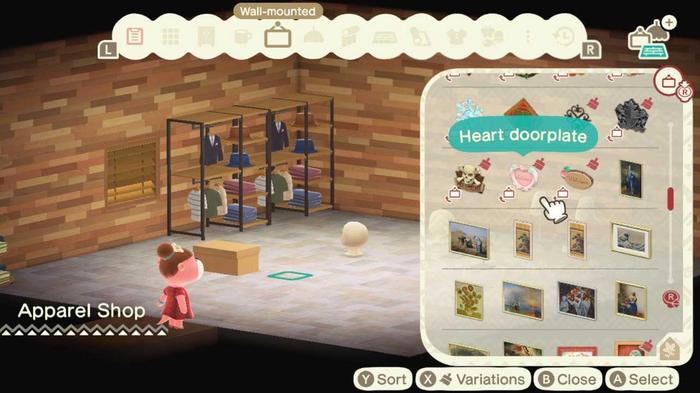 Animal Crossing New Horizons Happy Home Paradise. The wall-mounted furniture menu is being displayed and a heart doorplate is highlighted.