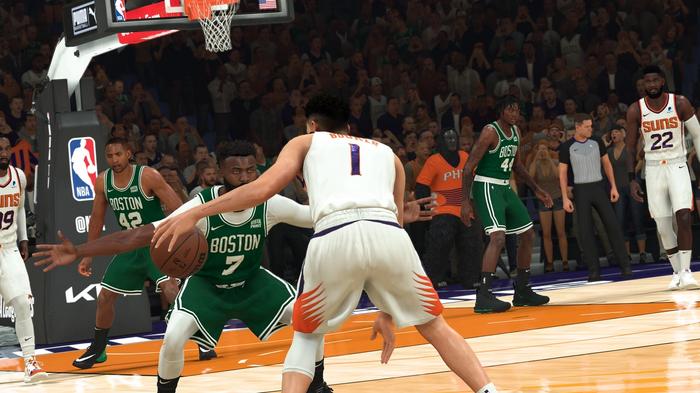Image of a basketball player dribbling the ball in NBA 2K23.
