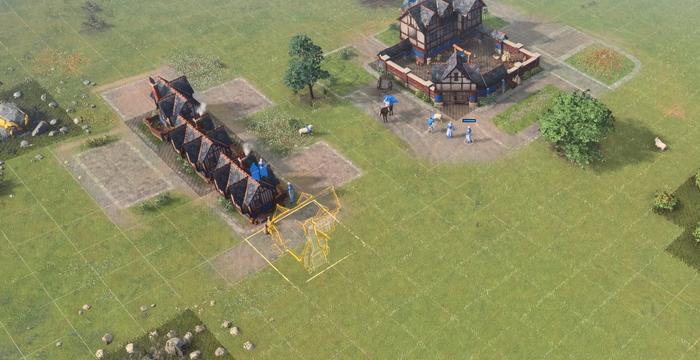 A House being placed alongside already built constructions in Age of Empires 4.