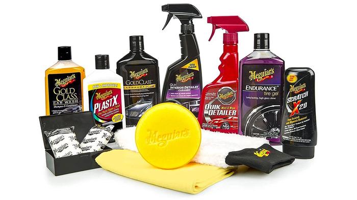 Best car cleaning products Meguiar's Complete Car Care Kit product image of a selection of bottles, clothes, and other car cleaning products.