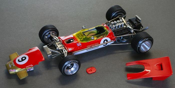 Lotus 49B 1968 product image of a retro red and white F1 car model.