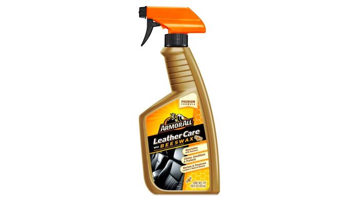 Best car leather cleaner Armor All product image of a gold bottle with an orange spray cap.