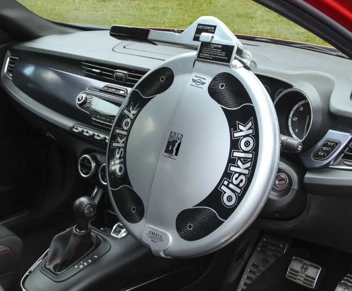 Best steering wheel lock Disklok product image of a grey full wheel cover.