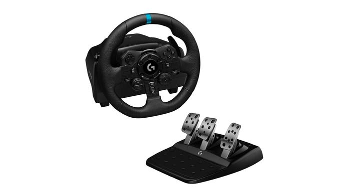 Best sim racing pedals Logitech G923 product image of a black sim wheel next to a set of black and silver pedals.