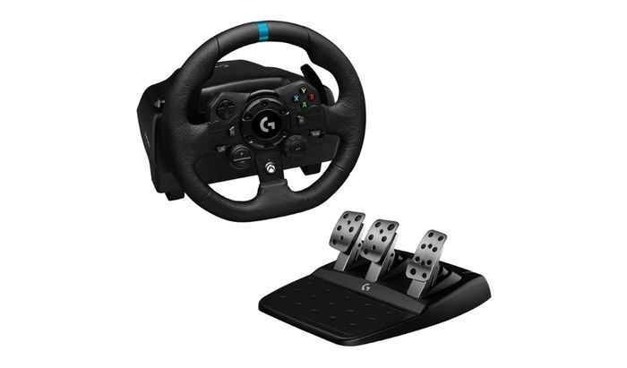 Logitech racing wheel in black with peddles.