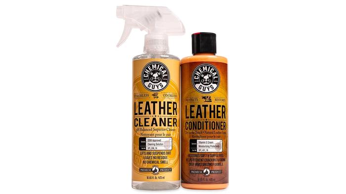 Best car leather cleaner Chemical Guys product image of a clear spray bottle with an orange label next to the conditioner bottle with brown labelling.